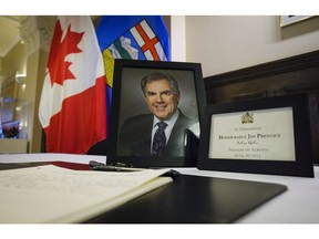 Former Alberta premier Jim Prentice will have his official portrait unveiled at the provincial legislature on Monday. A book of condolence for former Alberta premier Jim Prentice is on display at the MacDougal Centre in Calgary, Monday, Oct. 17, 2016.