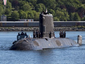 HMCS Windsor, one of Canada's Victoria-class long range patrol submarines, returns to port in Halifax on June 20, 2018.