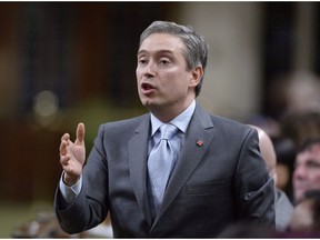 Minister of International Trade Francois-Philippe Champagne rises during Question Period in the House of Commons on Parliament Hill in Ottawa on Thursday, March 1, 2018. A federal agency built to find new ways to finance infrastructure projects says it is in deep talks on over a dozen projects that would only become publicly known when contracts are signed.