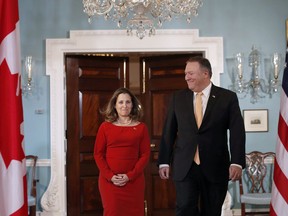 The United States has denounced a death sentence imposed on a British Columbia man in China as "politically motivated," adding heft to Ottawa's effort to intensify international pressure on Beijing to spare his life and to release two other detained Canadians. Canadian Minister of Foreign Affairs, Chrystia Freeland arrives with Secretary of State Mike Pompeo for a photo opportunity before their meeting at the State Department in Washington, Friday, May 11, 2018.