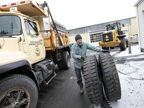 A mechanic changes out used tires as Walliingford Public Works crews prepare for the incoming storm, Fri., Jan. 18, 2019. State and local officials advise area residents to prepare for a mixture of snow and sleet predicted to fall throughout the weekend.