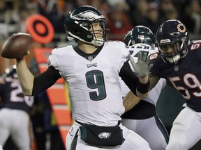 Philadelphia Eagles quarterback Nick Foles (9) passes during the first half of an NFL wild-card playoff football game against the Chicago Bears Sunday, Jan. 6, 2019, in Chicago.
