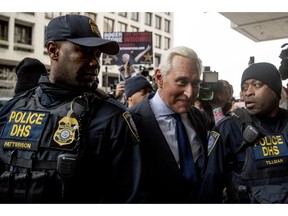 Former campaign adviser for President Donald Trump, Roger Stone arrives at Federal Court, Tuesday, Jan. 29, 2019, in Washington.