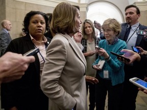 House Speaker Nancy Pelosi of Calif. speaks to reporters as she arrives back at the Capitol building after meeting with President Donald Trump about border security in the Situation Room of the White House in Washington, Friday, Jan. 4, 2019.