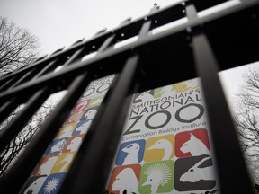 The gate of the closed Smithsonian's National Zoo is seen, Wednesday, Jan. 2, 2019, in Washington. Smithsonian's National Zoo due to the partial government shutdown. President Donald Trump is convening a border security briefing Wednesday for Democratic and Republican congressional leaders as a partial government shutdown over his demand for border wall funding entered its 12th day.