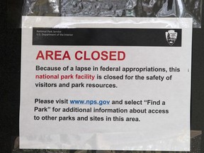 A closed sign is displayed on a door at the Lincoln Memorial in Washington, Tuesday, Jan. 1, 2019, as a partial government shutdown stretches into its third week. A high-stakes move to reopen the government will be the first big battle between Nancy Pelosi and President Donald Trump as Democrats come into control of the House.