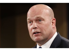 Acting Attorney General Matt Whitaker announces an indictment on violations including bank and wire fraud, Monday, Jan. 28, 2019, of Chines telecommunications companies including Huawei, at the Justice Department in Washington.