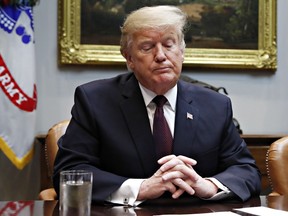President Donald Trump pauses while speaking during a healthcare roundtable in the Roosevelt Room of the White House, Wednesday, Jan. 23, 2019, in Washington.