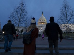 The Capitol is seen as New Year's Day comes to a close with the partial government shutdown in its second week, in Washington, Tuesday, Jan. 1, 2019. The new House majority led by Democrat Nancy Pelosi gavels into session this week with legislation ready to end the government shutdown.