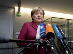 German Chancellor Angela Merkel talks about the decision by British lawmakers to oppose the agreement negotiated by British Prime Minister Theresa May and the EU, during a statement at a parliament building in Berlin, Jan. 16, 2019.