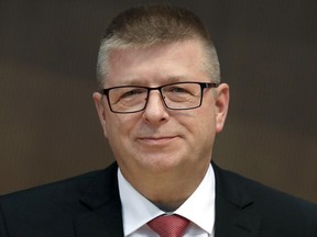 FILE - In this Friday, Nov. 16, 2018 file photo Thomas Haldenwang, head of the German Federal Office for the Protection of the Constitution, arrives for a public hearing at the parliamentary control committee of the German federal parliament, Bundestag, in Berlin, Germany. German media report that the country's domestic intelligence agency will announce it's putting the far-right Alternative for Germany party under heightened scrutiny.