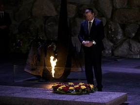Lithuania's Prime Minister Saulius Skvernelis pays his respects at a ceremony at the Hall of Remembrance at the Yad Vashem Holocaust Memorial in Jerusalem, Tuesday Jan. 29, 2019.