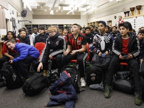 Students at St. Nicholas Catholic Junior High School watch the FC Bayern Munich vs TSG 1899 Hoffenheim on tv in Edmonton, Alta., on Friday January 18, 2019. Former Nicholas Catholic Junior High student, Alphonso Davies joined Bayern Munich in the new year, following a $22-million transfer from the Vancouver Whitecaps.