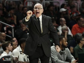 Miami head coach Jim Larranaga gestures to his players during the first half of an NCAA college basketball game against North Carolina on Saturday, Jan. 19, 2019, in Coral Gables, Fla.
