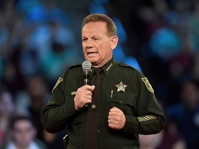 FILE - This Feb. 21, 2018 file photo, shows Broward County Sheriff Scott Israel speaking before a CNN town hall broadcast, at the BB&T Center, in Sunrise, Fla. New Florida Gov. Ron DeSantis suspended Broward County Sheriff Scott Israel on Friday, Jan. 11, 2019 over his handling of February's massacre at Marjory Stoneman Douglas High School.