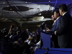 Florida Governor-elect Ron DeSantis, center, speaks during a news conference following a luncheon, Monday, Jan. 7, 2019, in Tallahassee, Fla. At left is Senate President Bill Galvano, and at right is House Speaker Jose Oliva. Newly elected officials will be sworn in at the inauguration Tuesday.