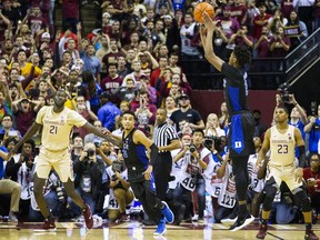 Duke forward Cam Reddish takes the game-winning shot against Florida State with less than a second left in an NCAA college basketball game in Tallahassee, Fla., Saturday, Jan. 12, 2019. Duke defeated Florida State 80-78.