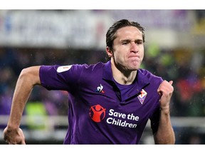 Fiorentina's Federico Chiesa celebrates after scoring  during the Italian Cup quarterfinal soccer match between Fiorentina and Roma, at the Artemio Franchi stadium in Florence, Italy, Wednesday, Jan. 30, 2019.