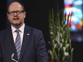 FILE - The May 4, 2016 file photo shows Gdansk mayor Pawel Adamowicz speaking at a commemoration ceremony for late Bremen Mayor Hans Koschnick. Poland's health minister says that Gdansk Mayor Pawel Adamowicz has died from stab wounds a day after being attacked onstage by an ex-convict at a charity event.