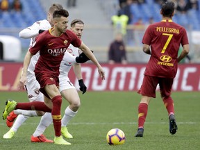 Roma's Stephan El Sharaawy runs with the ball during a Serie A soccer match between Roma and Torino, at the Rome Olympic Stadium, Saturday, Jan. 19, 2019.