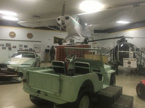 In this Nov. 29, 2018 photo, a vintage U.S. Border Patrol vehicle sits in a museum for the border patrol in El Paso, Texas. The U.S. Border Patrol Museum explores the story from the agency's formation to fight Chinese immigration and Prohibition, to its role amid massive migration and cartel drug smuggling.