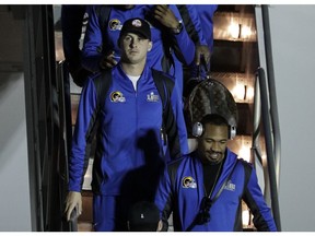 Los Angeles Rams' Jared Goff gets off the team charter as they arrive at the Hartsfield-Jackson Atlanta International Airport for the NFL Super Bowl 53 football game Sunday, Jan. 27, 2019, in Atlanta.