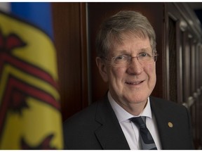 Nova Scotia's Chief Justice Michael MacDonald stands in his office during his last days on the job in Halifax on Wednesday, Jan. 30, 2019. MacDonald was first appointed to the trial division of the Supreme Court in 1995 and later named associate chief justice of the court. He became the province‚Äôs chief justice and chief of the Appeal Court in 2004.