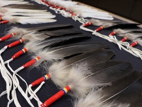 Eagle feathers are shown during a RCMP press conference in Winnipeg on Tuesday, Jan. 22, 2019. People in Manitoba will now be able to swear legal oaths on an eagle feather when they are in an RCMP detachment. Assistant Commissioner Scott Kolody, the force's commanding officer in the province, says it's important because the eagle feather can give some people the strength to talk and empower them to speak their truth.