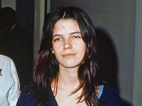 FILE - This March 29, 1971, file photo shows Leslie Van Houten in a Los Angeles lockup. The youngest follower of murderous cult leader Charles Manson will ask a state panel to recommend her for parole. Van Houten, who is now 69, is scheduled for a parole hearing Wednesday, Jan. 30, 2019 at the California Institute for Women. Van Houten was previously recommended for parole twice by a state panel but former California Gov. Jerry Brown blocked her release.