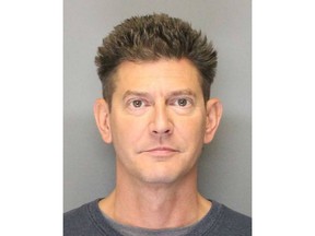 This 2018 booking photo released by the Yolo County Sheriff's Office shows Kevin Douglas Limbaugh. Authorities identified the 48-year-old Limbaugh as the man who shot and killed Davis, Calif., rookie police officer Natalie Corona, 22, on Thursday, Jan. 10, 2019, and later took his own life during a standoff with police. The Sacramento Bee reports that court documents show Limbaugh was convicted in a battery case and agreed in November to surrender a semiautomatic rifle. (Yolo County Sheriff's Office via AP)