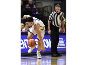 LSU guard Skylar Mays (4) keeps his eyes on the ball after knocking it loose for a steal in the first half of an NCAA college basketball game, Wednesday, Jan. 23, 2019, in Baton Rouge, La.