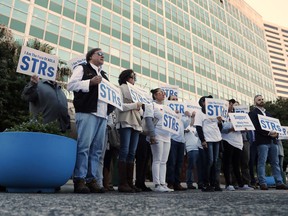 Short term rental property owners protest outside City Hall in New Orleans, Thursday, Jan. 10, 2019. City Council members in New Orleans are set to discuss proposals that could sharply curtail short-term vacation-rentals of whole houses in residential neighborhoods.