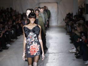 Model Winnie Harlow wears a creation as part of the John Richmond men's Fall-Winter 2019-20 collection, that was presented in Milan, Italy, Sunday, Jan.13, 2019.