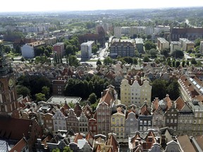 FILE - This Tuesday, Sept. 6, 2011 file photo shows a general view of Gdansk seen from the tower of St. Mary's Church, in Gdansk, Poland. The Polish port city of Gdansk, whose mayor died after being stabbed while on stage during a charity fundraiser, is among Poland's most famous cities due to the key role it played in 20th century European history, from the early shots of World War II to the end days of the Cold War. Mayor Pawel Adamowicz, who died Monday, Jan. 14, 2019 as a result of wounds to his heart and abdomen, was among the many who have called it a city of "freedom of Solidarity," a reference to the anti-communist movement born in the city's shipyard in 1980.