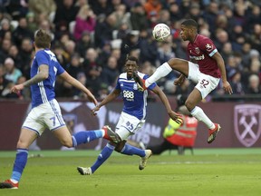 West Ham United's Xande Silva, right, in action with Birmingham City's Wes Harding during the English FA Cup, third round soccer match at London Stadium, England, Saturday Jan. 5, 2019.