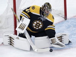 Boston Bruins goaltender Jaroslav Halak makes a save during the first period of an NHL hockey game against the Winnipeg Jets in Boston, Tuesday, Jan. 29, 2019.