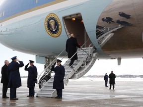 President Donald Trump boards Air Force One at Andrews Air Force Base, Md., Monday Jan. 14, 2019, en route to New Orleans.