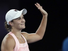 Australia's Ashleigh Barty celebrates after defeating Greece's Maria Sakkari during their third round match at the Australian Open tennis championships in Melbourne, Australia, Friday, Jan. 18, 2019.