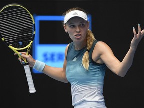 Denmark's Caroline Wozniacki gestures during her second round match against Sweden's Johanna Larsson at the Australian Open tennis championships in Melbourne, Australia, Wednesday, Jan. 16, 2019.