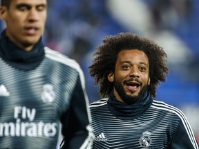 Real Madrid's Marcelo warms up prior of a Spanish Copa del Rey soccer match between Leganes and Real Madrid at the Butarque stadium in Leganes, Spain, Wednesday, Jan. 16, 2019.