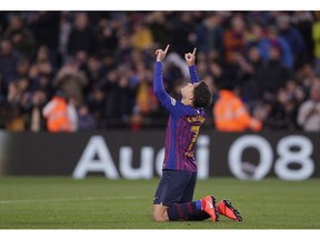 FC Barcelona's Coutinho celebrates after scoring during a Spanish Copa del Rey soccer match between FC Barcelona and Sevilla at the Camp Nou stadium in Barcelona, Spain, Wednesday, Jan. 30, 2019.