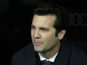 Real Madrid's coach Santiago Solari looks on prior of a Spanish Copa del Rey soccer match between Real Madrid and Girona at the Bernabeu stadium in Madrid, Spain, Thursday, Jan. 24, 2019.