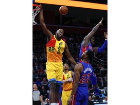 Milwaukee Bucks forward Khris Middleton (22) loses the ball as Detroit Pistons guard Reggie Jackson (1) defends during the first half of an NBA basketball game in Detroit, Tuesday, Jan. 29, 2019.