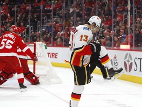 Calgary Flames left wing Johnny Gaudreau (13) celebrates his goal in the third period of an NHL hockey game against the Detroit Red Wings, Wednesday, Jan. 2, 2019, in Detroit.