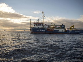The Sea-Watch ship waits off the coast of Malta, Tuesday, Jan. 8, 2018. Two German nonprofit groups are appealing to European Union countries to take in 49 migrants whose health is deteriorating while they are stuck on rescue ships in the Mediterranean Sea. Sea-Watch and Sea-Eye representatives told reporters in Berlin on Tuesday that drinking water was being rationed on their ships and some migrants had trouble eating due to illness.