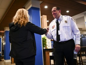Barron County Sheriff Chris Fitzgerald is greeted early Friday, Jan. 11, 2018  in Rice Lake, Wis.  Jayme Closs, a Wisconsin teenager missing for nearly three months after her parents were killed in the family home was found alive by a woman who stumbled across the 13-year-old girl.  The Douglas County Sheriff's Office confirmed on its website that Jayme was found in the town at 4:43 p.m. Thursday, and that a suspect was taken into custody 11 minutes later.