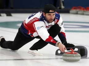 In this Jan. 3, 2019 photo, former Minnesota Vikings football player Jared Allen practices with his curling team for a competition in Blaine, Minn. Allen retired from the NFL in 2015 and wasn't ready to give up on the competition he'd come to enjoy as a five-time All-Pro in a 12-year career. His solution: Make it to the 2022 Olympics _ in curling. Less than a year later, he and three other former NFL players who have never curled before will attempt to qualify for the U.S. championships against curlers who have been throwing stones for most of their lives.