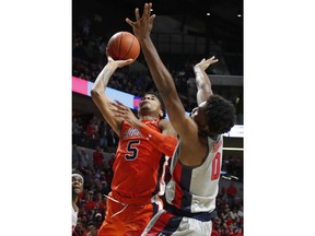 Auburn forward Chuma Okeke (5) shoots as Mississippi guard Blake Hinson (0) defends during the first half of an NCAA college basketball game Wednesday, Jan. 9, 2019, in Oxford, Miss.