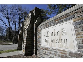 This Jan. 28, 2019 photo shows the entrance to the main Duke University campus in Durham, N.C. The Duke University professor and administrator who sparked an outcry by admonishing students for speaking Chinese has issued a personal apology amid an internal review by the school.