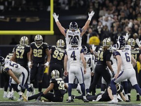 Los Angeles Rams kicker Greg Zuerlein reacts after his game-winning field goal in overtime of the NFL football NFC championship game against the New Orleans Saints, Sunday, Jan. 20, 2019, in New Orleans. The Rams won 26-23.